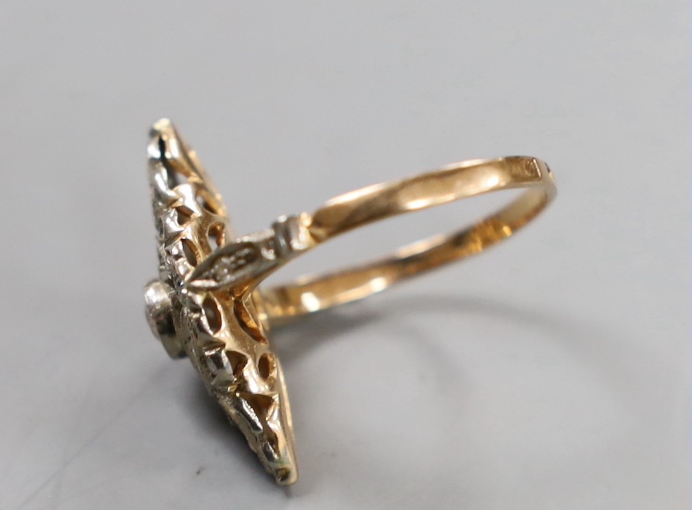 A 1950's Soviet 583 yellow metal (14k) and diamond set marquise cluster ring, size P/Q, gross weight 4.1 grams.